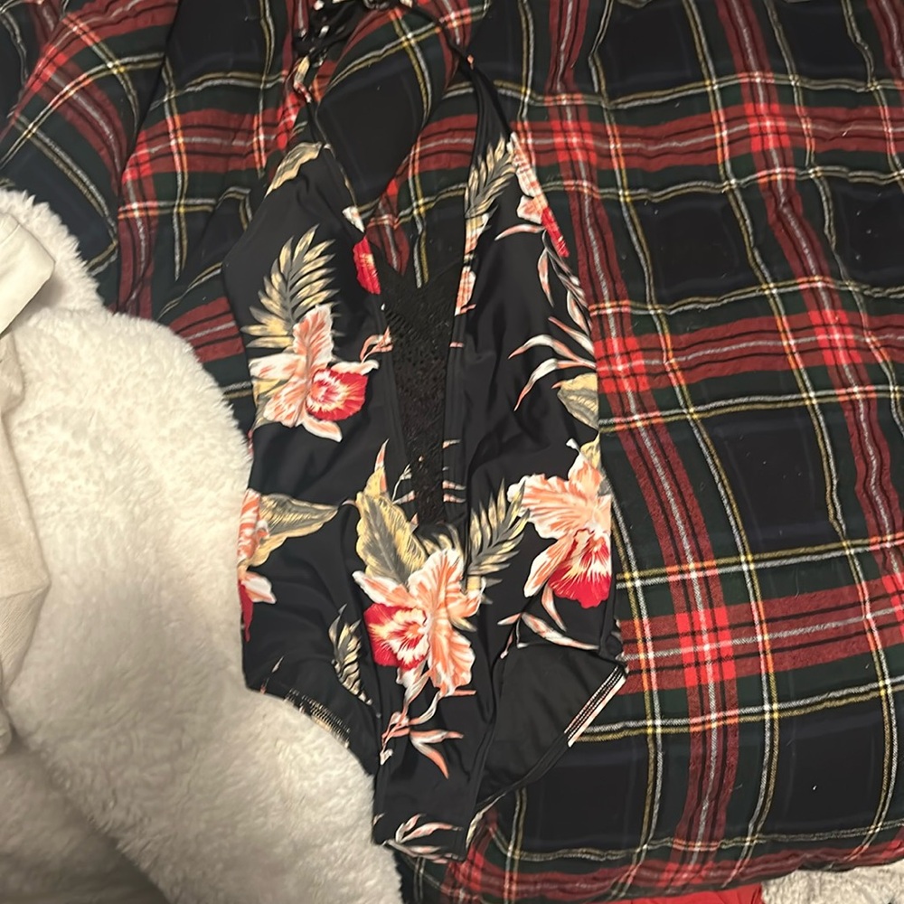 NWT never warn in perfect condition Roxy one piece swim suit.